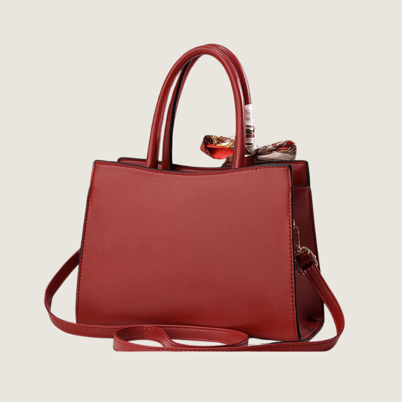 A Bolsa Bordada Carafori oferece sofisticação atemporal com couro premium, alça ajustável e espaço interno funcional. Perfeita para looks elegantes e modernos.