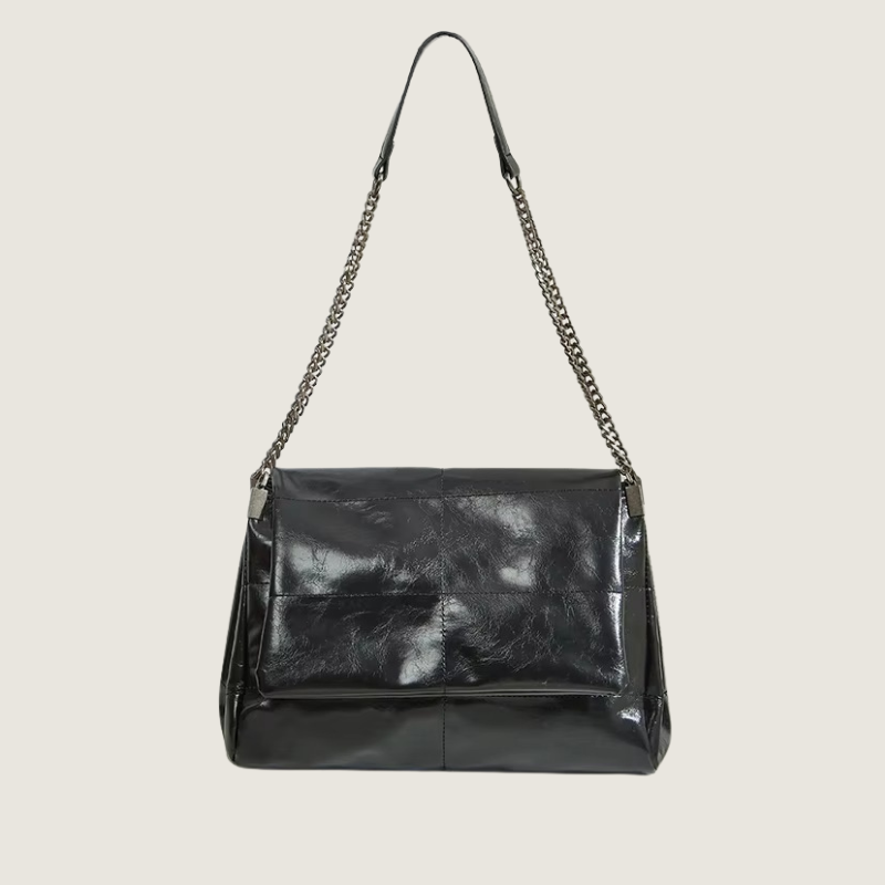 Bolsa feminina Carafori crossbody de ombro com corrente metálica, design sofisticado e acabamento em couro premium.