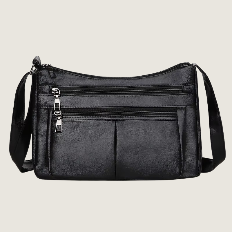 A Bolsa Carafori Ombro & Crossbody une couro tecnológico premium, design minimalista e compartimentos inteligentes. Sofisticação e funcionalidade para o dia a dia.
