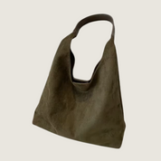 Bolsa Carafori retrô a tiracolo com grande capacidade. Estilo clássico e praticidade no mesmo design exclusivo.