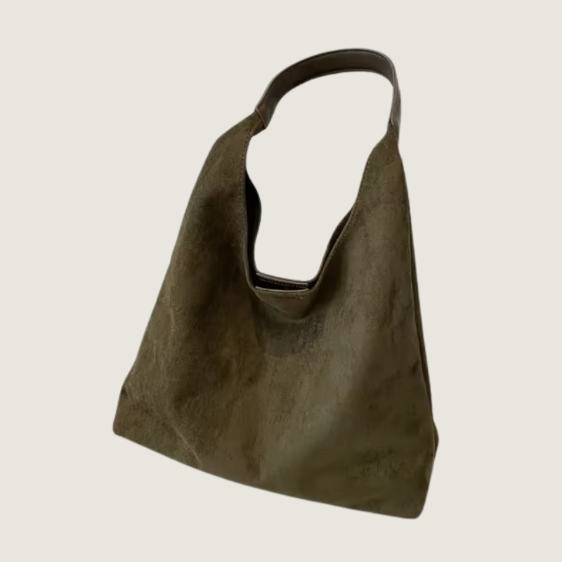 Bolsa Carafori retrô a tiracolo com grande capacidade. Estilo clássico e praticidade no mesmo design exclusivo.
