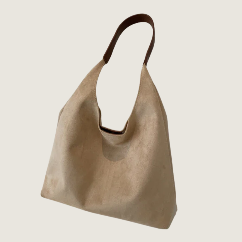 Bolsa Carafori feminina de ombro. Luxo discreto, conforto e funcionalidade com acabamento sofisticado.