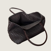Bolsa Carafori tote grande preta em couro PU com trama sofisticada. Modelo elegante e versátil para uso diário ou viagens curtas.