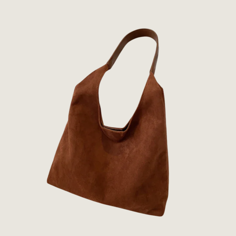 Bolsa feminina Carafori vintage a tiracolo. Elegância atemporal, design retrô e amplo espaço para o dia a dia.