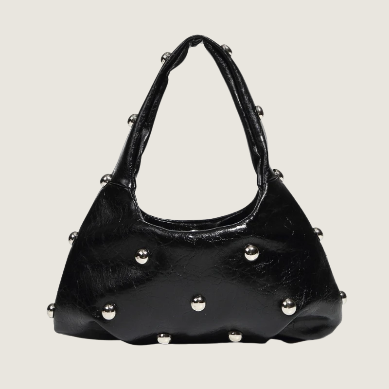 Bolsa de ombro Carafori com design moderno, detalhes metálicos e textura suave de couro.