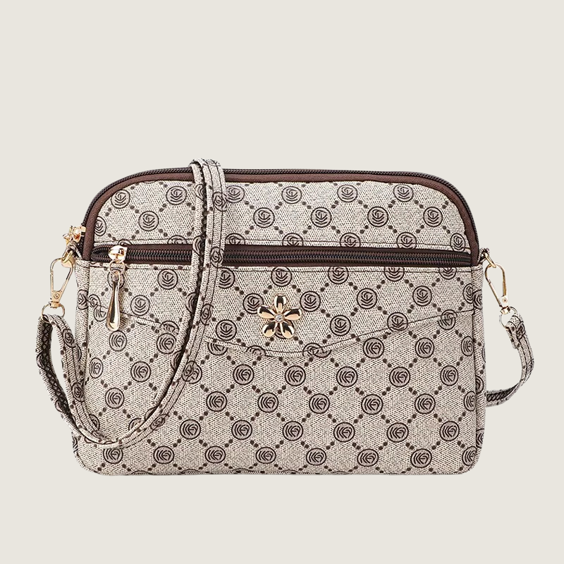 Bolsa crossbody Carafori com design atemporal, acabamento refinado e compartimentos práticos para uso versátil no dia a dia.
