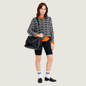 Bolsa Carafori sofisticada, tiracolo e ombro, em couro ecológico premium, perfeita para ocasiões casuais ou formais.