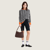 Bolsa pequena com alça estruturada Carafori: luxo acessível e versatilidade para o dia a dia ou eventos especiais.