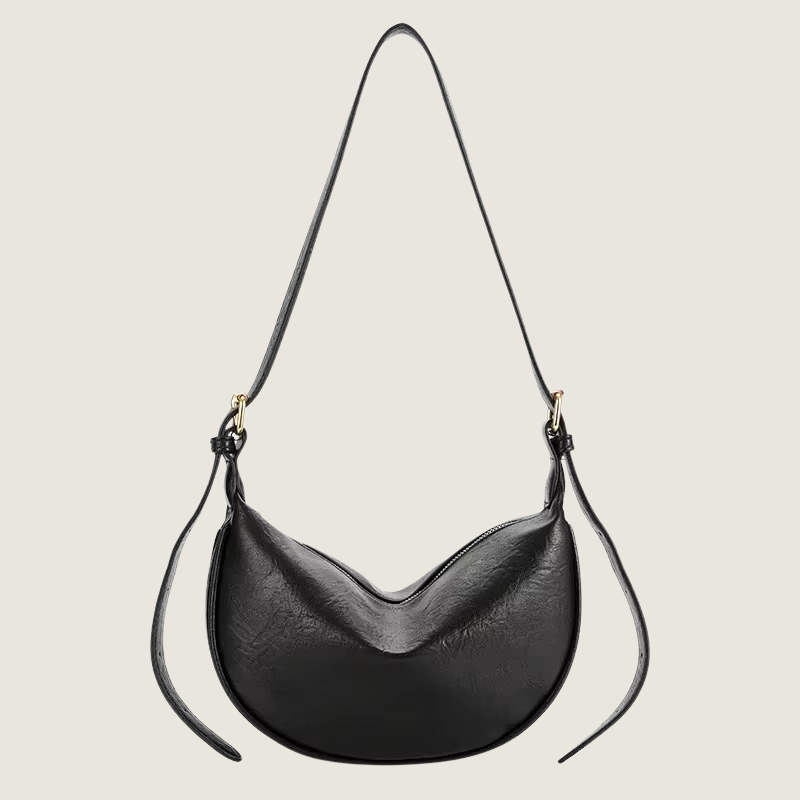 Bolsa feminina Carafori com amplo espaço interno, perfeita para rotina urbana e viagens sofisticadas.