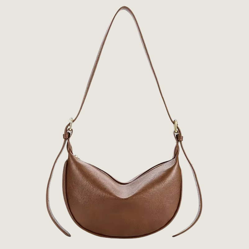 Bolsa hobo Carafori com design sofisticado e alça ajustável. Luxo minimalista e praticidade para todas as ocasiões.