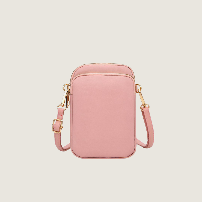 Leve, prática e sofisticada, a Mini Bolsa Carafori em nylon premium garante organização e estilo. Perfeita para uso no ombro ou como crossbody.