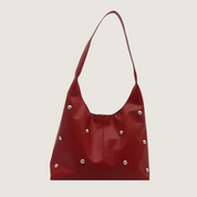 Com estrutura espaçosa e acabamento premium, a Bolsa Tote de Ombro Carafori é a escolha ideal para mulheres que valorizam sofisticação no dia a dia.