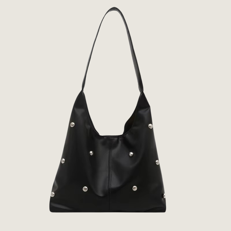 A Tote Carafori combina design clean, ampla capacidade e acabamento refinado. Perfeita para carregar laptop, livros e itens diários com elegância e praticidade.