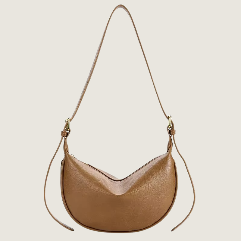 Bolsa transversal Carafori feita à mão no Brasil. Combina funcionalidade, conforto e acabamento refinado.