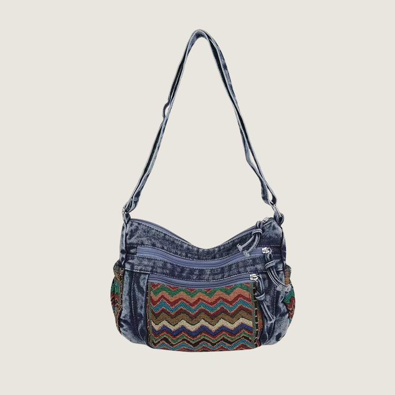Bolsa bordada étnica com detalhes artesanais, combinando sofisticação e praticidade para mulheres modernas.
