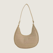 Versátil e confortável, a Bolsa Meia-Lua Carafori combina textura suave, leveza e segurança em zíper. Ideal para mulheres que buscam estilo e praticidade.