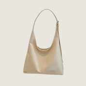 Bolsa tiracolo Carafori Estruturada. Sofisticação minimalista, couro PU refinado e funcionalidade para todos os momentos.