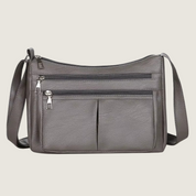 A Bolsa Carafori Ombro & Crossbody combina estilo sofisticado, compartimentos organizados e resistência à água. Um acessório exclusivo e funcional para qualquer ocasião.