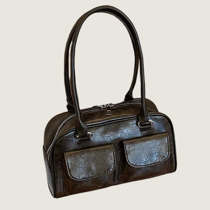 Sofisticação atemporal em cada detalhe. A Bolsa Carafori Retro combina charme vintage e praticidade contemporânea, perfeita para momentos de estilo refinado.