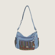 A Sacola Boho Denim 2025 une denim premium e bordado artesanal em estilo étnico. Espaçosa, versátil e sofisticada, é perfeita para uso no ombro ou crossbody.