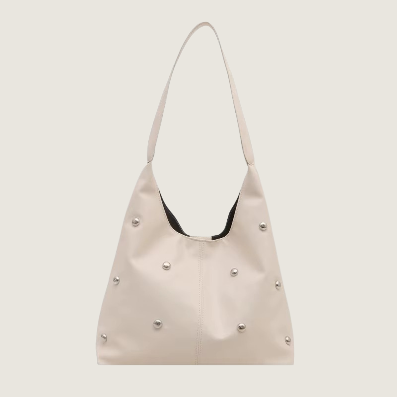 A Tote Bag Carafori traduz estilo urbano com funcionalidade. Alça única confortável, fecho seguro e espaço amplo tornam esta bolsa perfeita para toda ocasião.