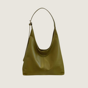 Bolsa Carafori Tote Minimalista. Estilo moderno e atemporal em couro PU, ideal para um look sofisticado e versátil.
