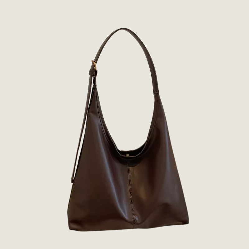 Bolsa Carafori Tote Ombro Clássica. Design atemporal, couro premium PU e espaço amplo para elegância e praticidade diárias.