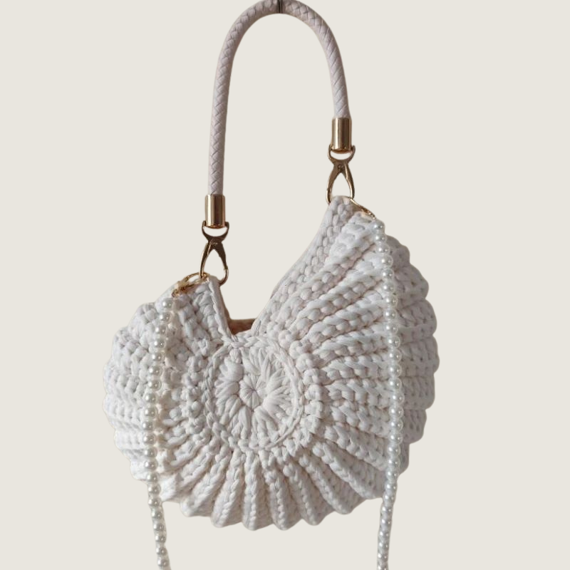 Bolsa Carafori pequena crossbody leve e prática, perfeita para uso versátil no dia a dia.