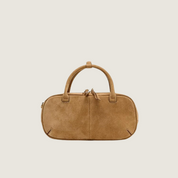 Mini bolsa baguette Carafori em camurça premium, design sofisticado com alça dupla e crossbody removível.